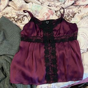 Lace/silk spaghetti strap top. Worn once or twice. Lost weight and now too big.